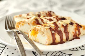 Crepes in salsa all’arancia