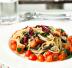 Spaghetti con radicchio e pomodorini