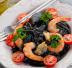 Tagliolini al nero di seppia con frutti di mare