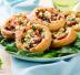Pizzette di sfoglia con spinaci e pomodorini