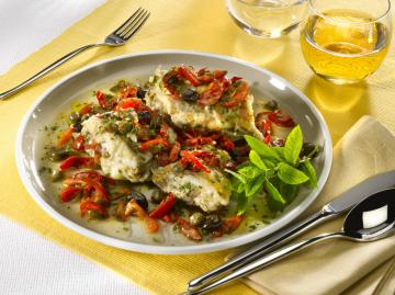 Dentice al forno con pomodorini e olive