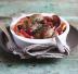 Pollo al forno con mele e uva