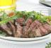 Tagliata di manzo con rucola e pomodorini